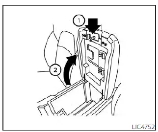 Nissan Pathfinder - Compartiment de rangement de la console